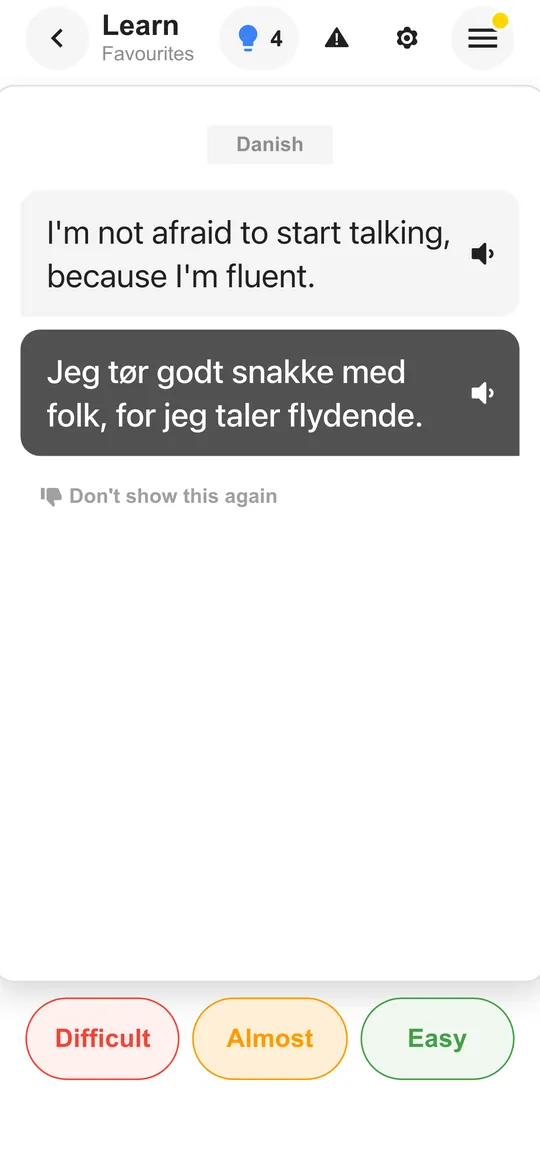 The Taalhammer app: a flashcard with a sentence and its answer revealed